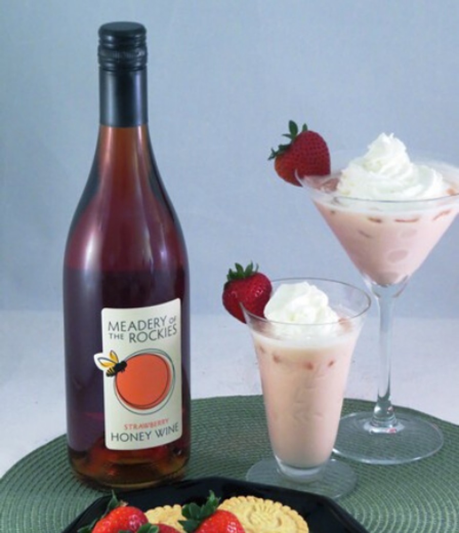 strawberry honey shortcake drink with bottle of Strawberry Honey wine