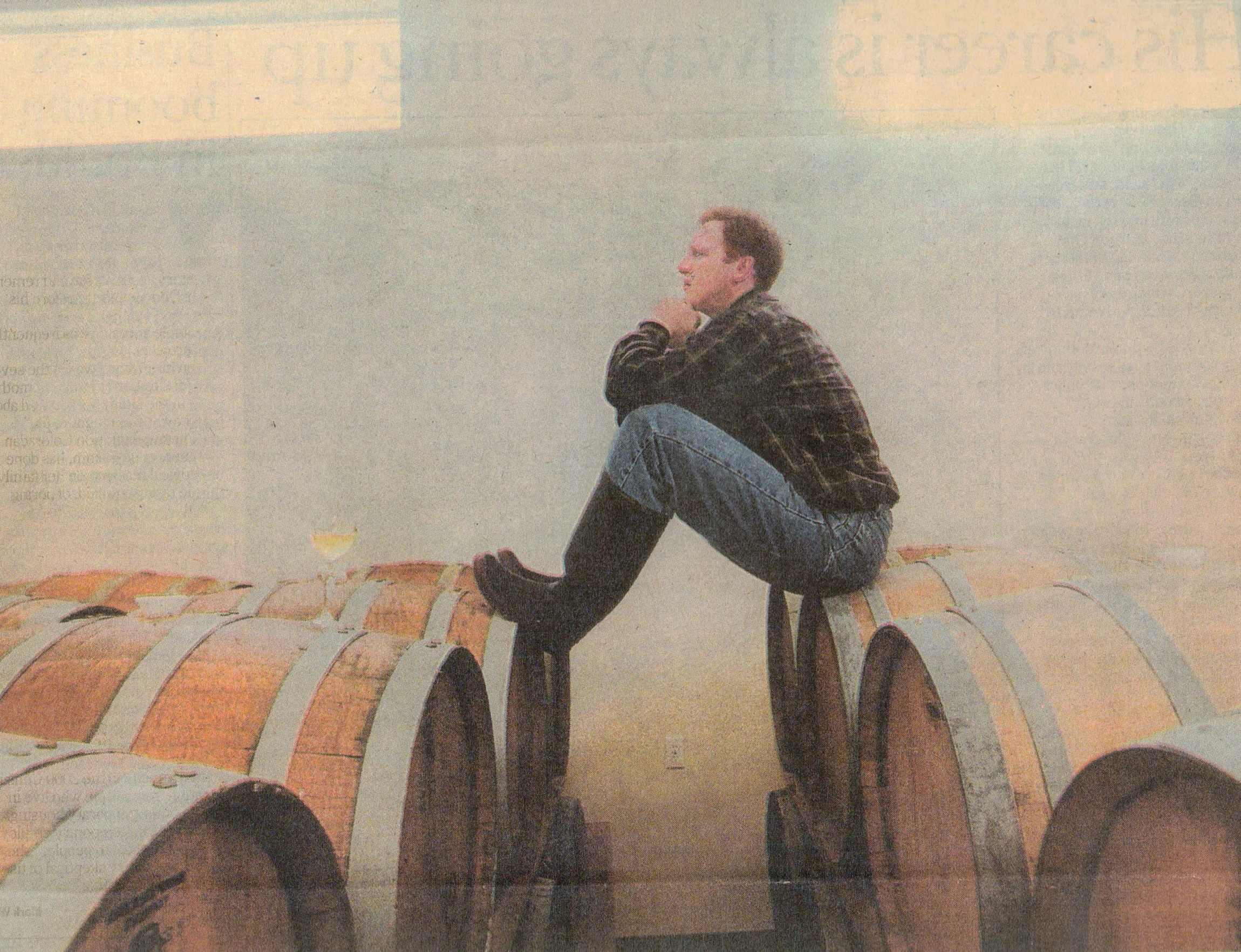 Glenn Foster sitting on barrels